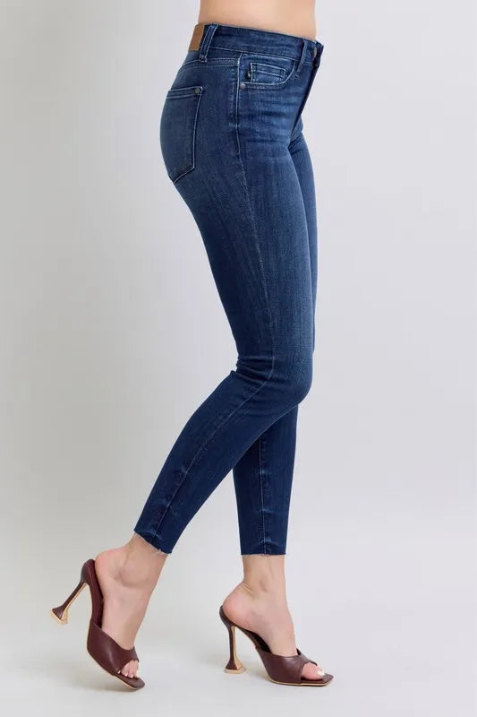 Judy Blue Full Size Mid Rise Skinny Jeans with Raw Hem Plus Size - Premium Women / Jeans & Denim from Trendsi - Just $55.99! Shop now at Handbags Specialist Headquarter