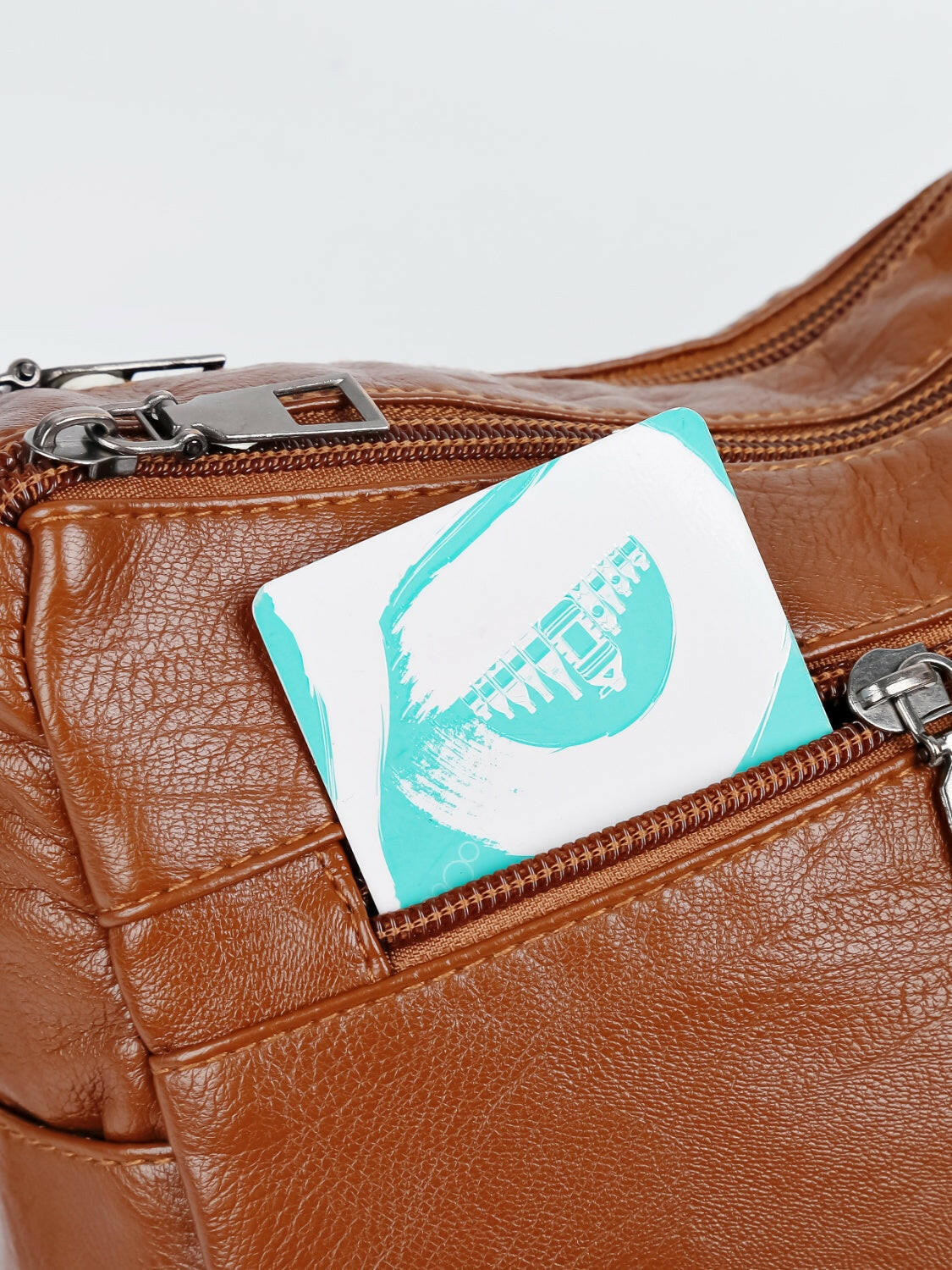 PU Leather Adjustable Strap Shoulder Bag.