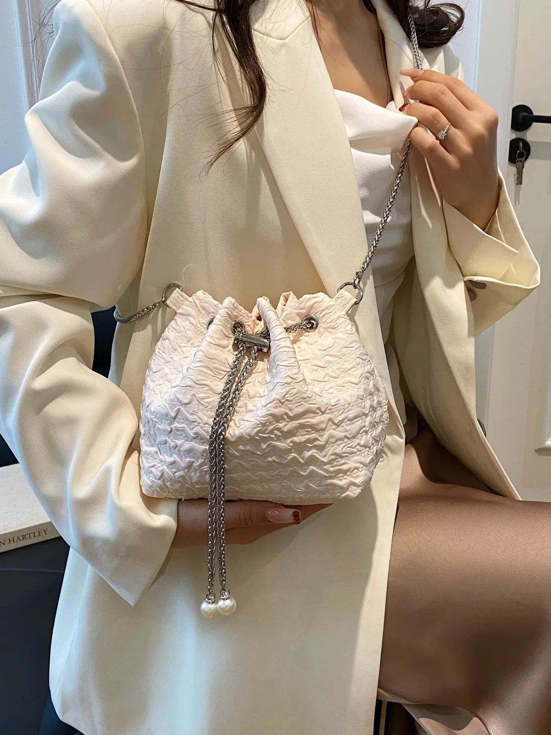 Textured Chain Bucket Bag.