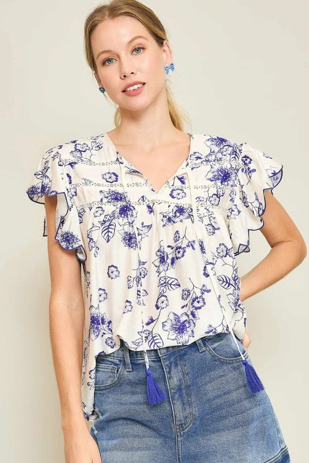 Umgee Full Size Floral Print Tassel Tie Neck Scalloped Sleeve Blouse Plus Size - Premium Dresses from Trendsi - Just $46.99! Shop now at Handbags Specialist Headquarter