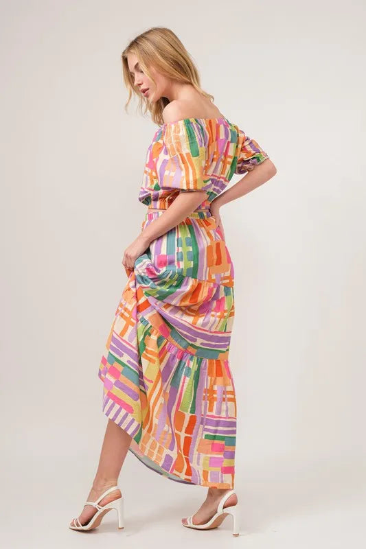 And The Why Asymmetric Geo Printed Tiered Maxi Skirt - Premium Skirts from Trendsi - Just $47.99! Shop now at Handbags Specialist Headquarter