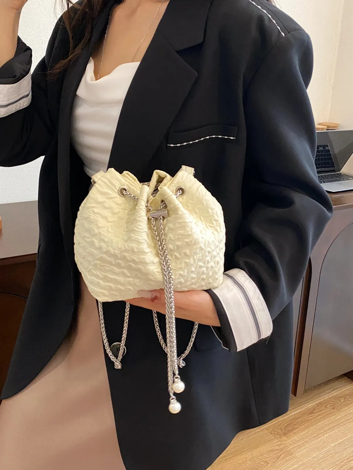 Textured Chain Bucket Bag.