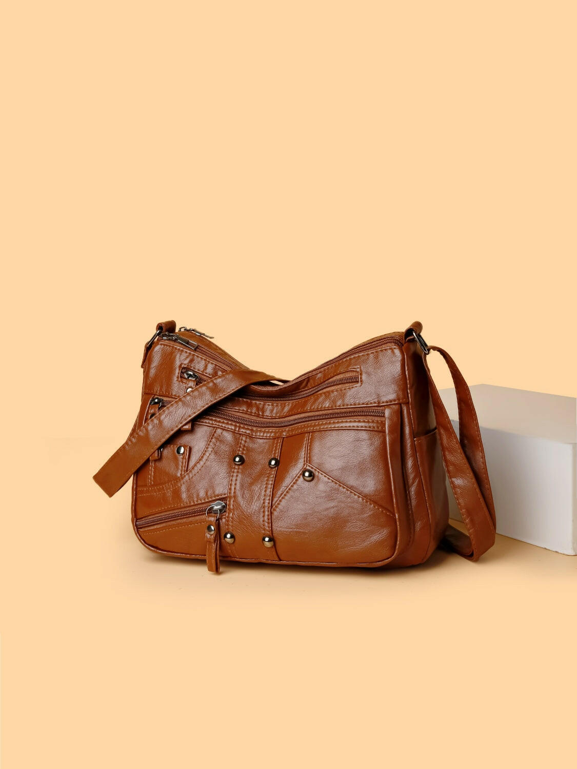 PU Leather Adjustable Strap Shoulder Bag.