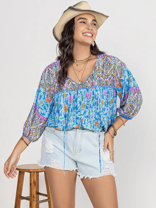 Plus Size Printed Tie Neck Balloon Sleeve Blouse - Premium Plus Size Shirts from Trendsi - Just $28! Shop now at Handbags Specialist Headquarter