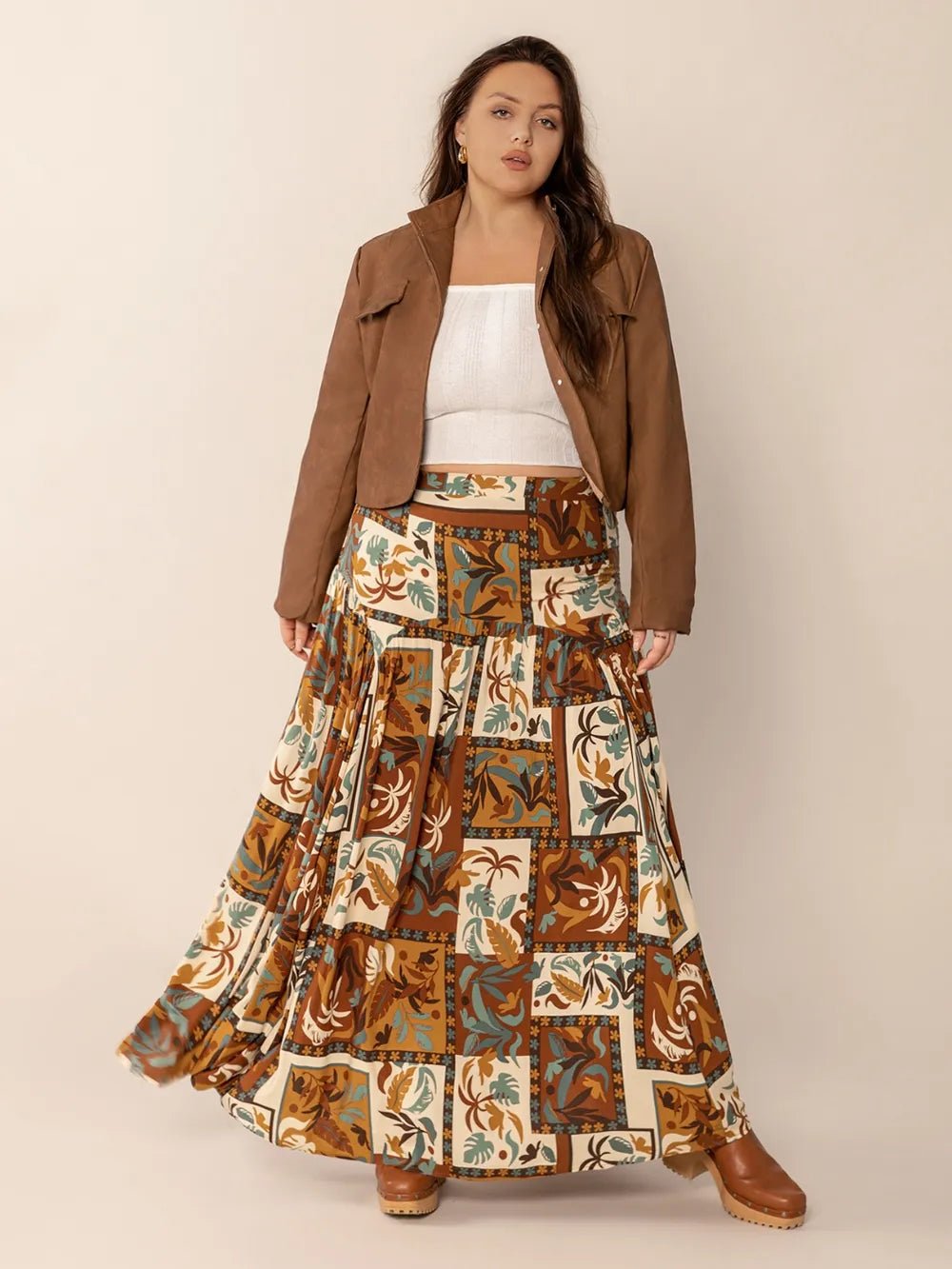 Plus Size Ruched Printed Maxi Skirt - Premium from Trendsi - Just $38.99! Shop now at Handbags Specialist Headquarter