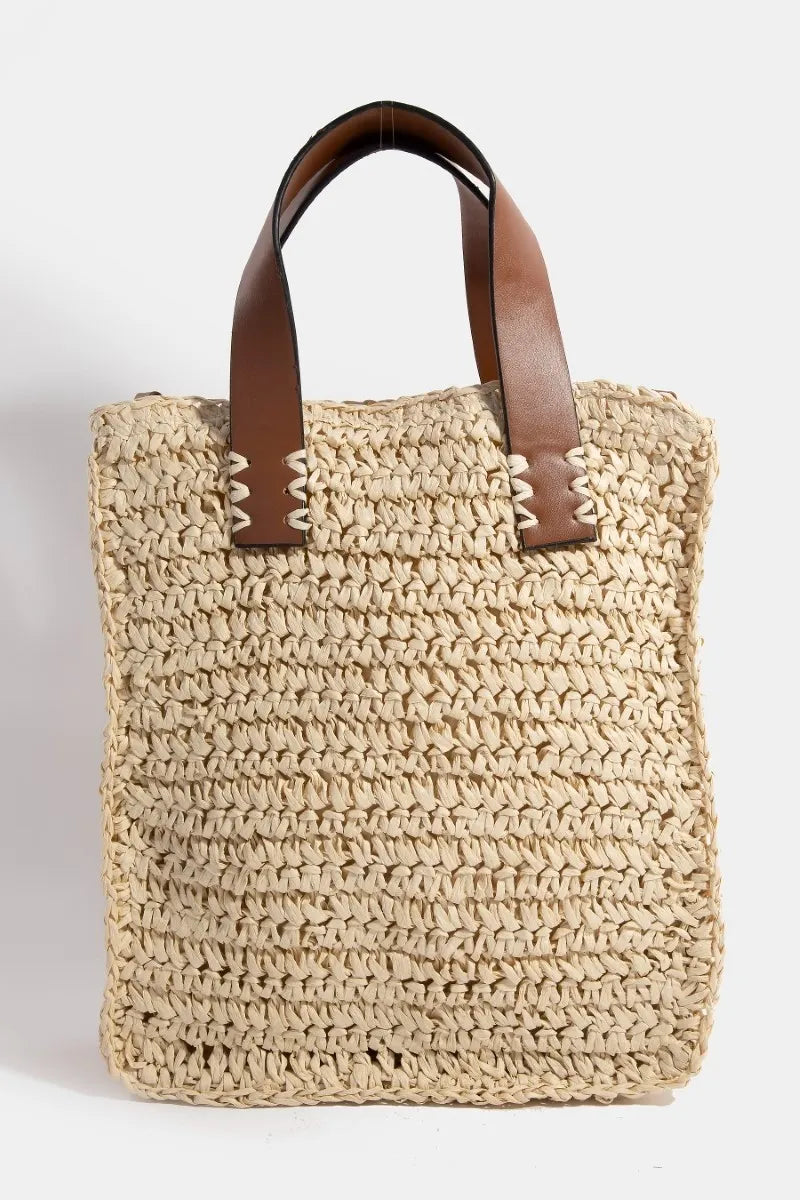 Fame Faux Leather Handle Straw Braided Handbag - Premium Tote Bag from Trendsi - Just $31.99! Shop now at Handbags Specialist Headquarter