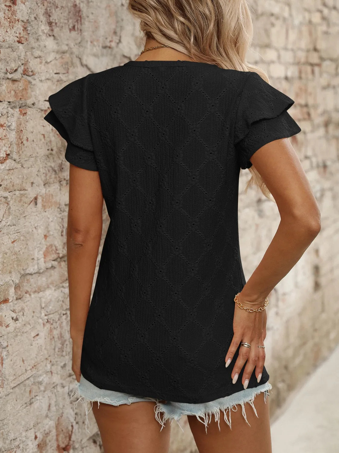 Eyelet V-Neck Ruffled Cap Sleeve Top - Premium Tops from Trendsi - Just $20.68! Shop now at Handbags Specialist Headquarter