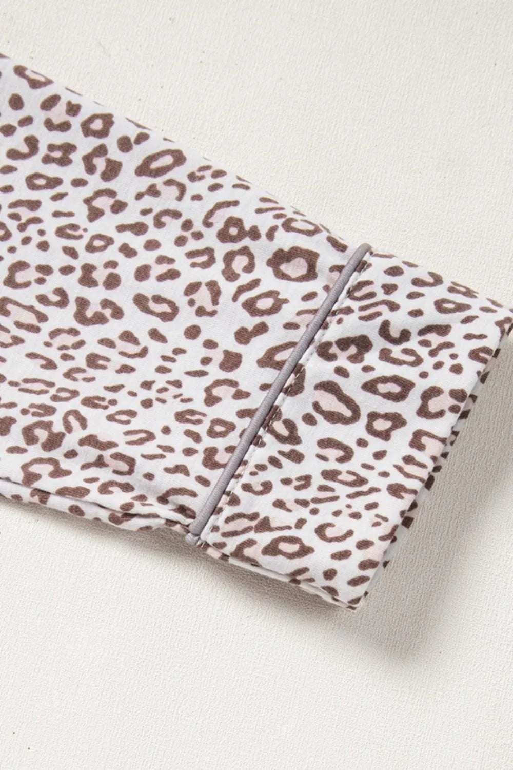 Leopard Button Down Long Sleeve Top and Pants Lounge Set - Premium Sleepwear from Trendsi - Just $49.34! Shop now at Handbags Specialist Headquarter