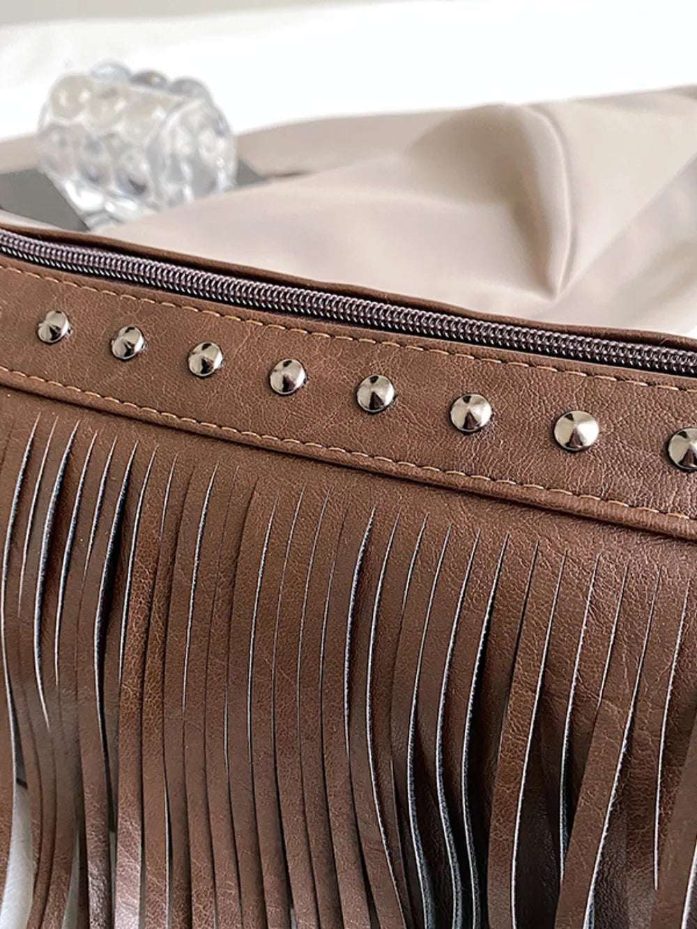 PU Leather Fringe Studded Crossbody Bag - Premium Crossbody Bag from Trendsi - Just $29.99! Shop now at Handbags Specialist Headquarter