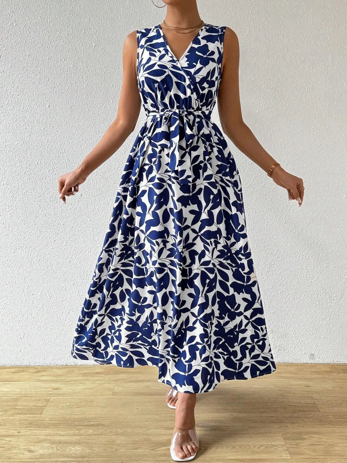 Printed Surplice Sleeveless Maxi Dress - Premium Maxi Dress from Trendsi - Just $43.99! Shop now at Handbags Specialist Headquarter