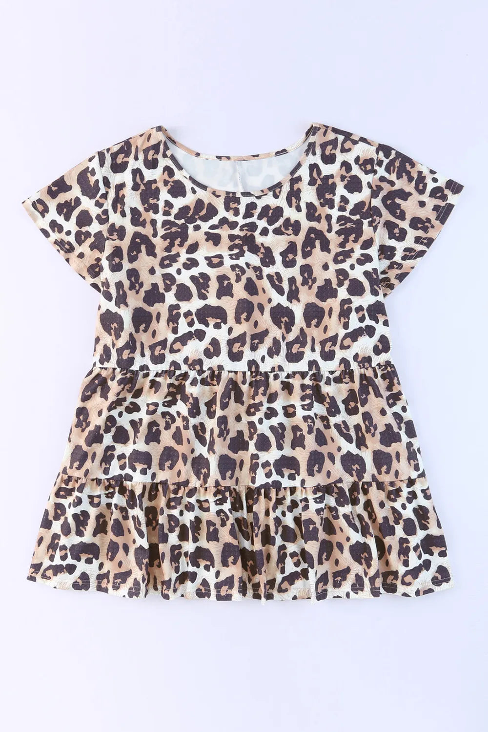 Plus Size Leopard Round Neck Blouse - Premium Plus Size Shirts from Trendsi - Just $21.48! Shop now at Handbags Specialist Headquarter
