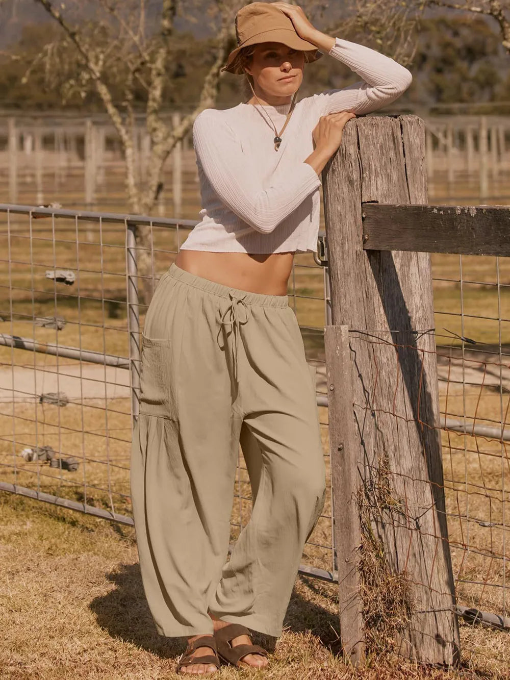 Full Size Wide Leg Pants with Pockets - Premium Women Pants from Trendsi - Just $42.99! Shop now at Handbags Specialist Headquarter