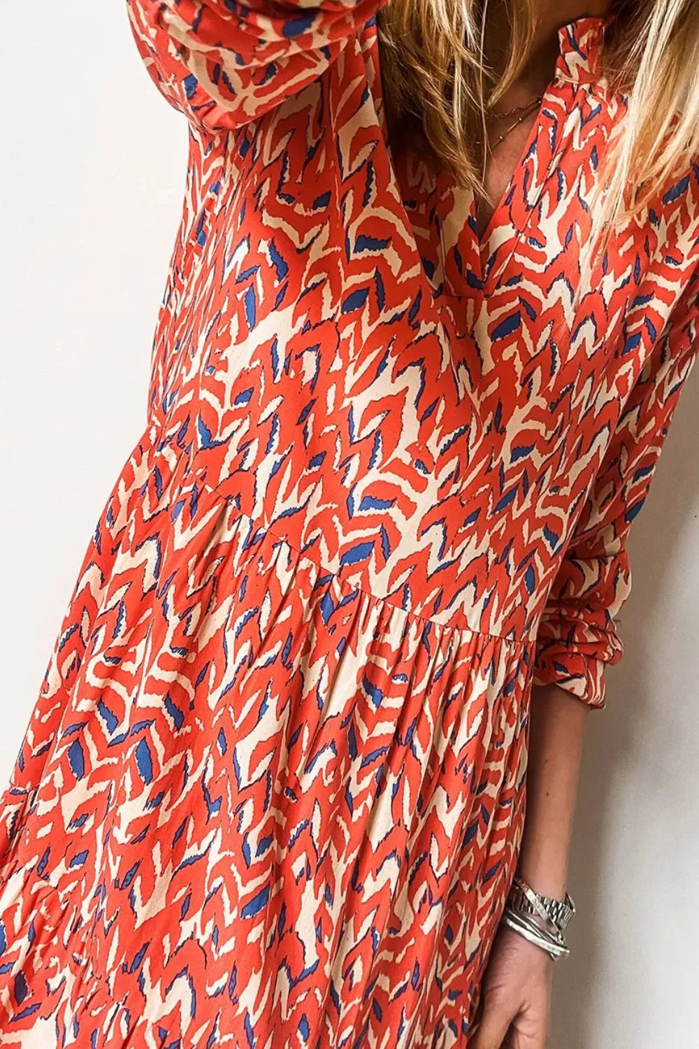 Plus Size Printed Notched Long Sleeve Dress - Premium Dresses from Trendsi - Just $51.99! Shop now at Handbags Specialist Headquarter