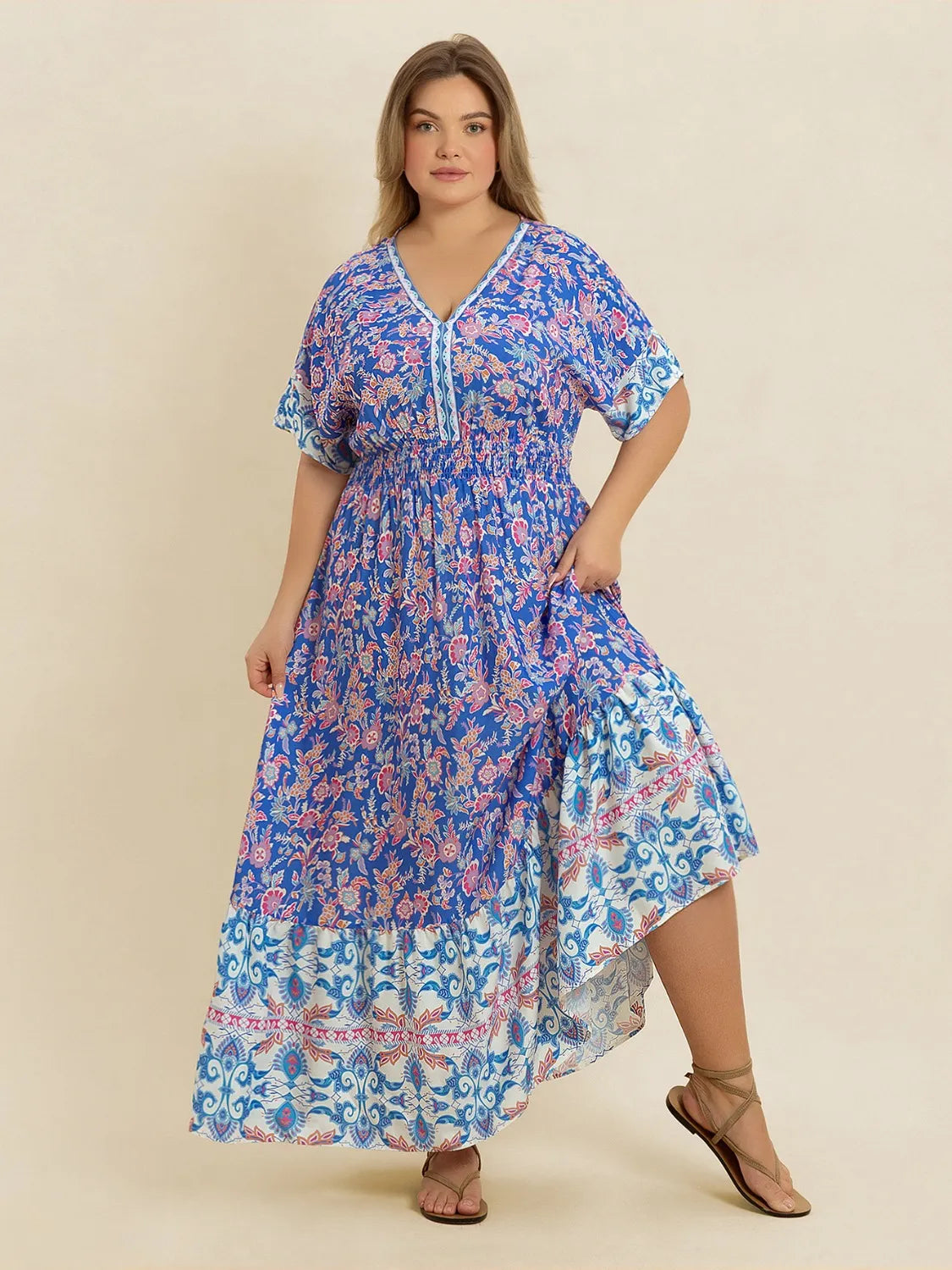 Plus Size Smocked Printed Half Sleeve Midi Dress - Premium Dresses from Trendsi - Just $43.99! Shop now at Handbags Specialist Headquarter