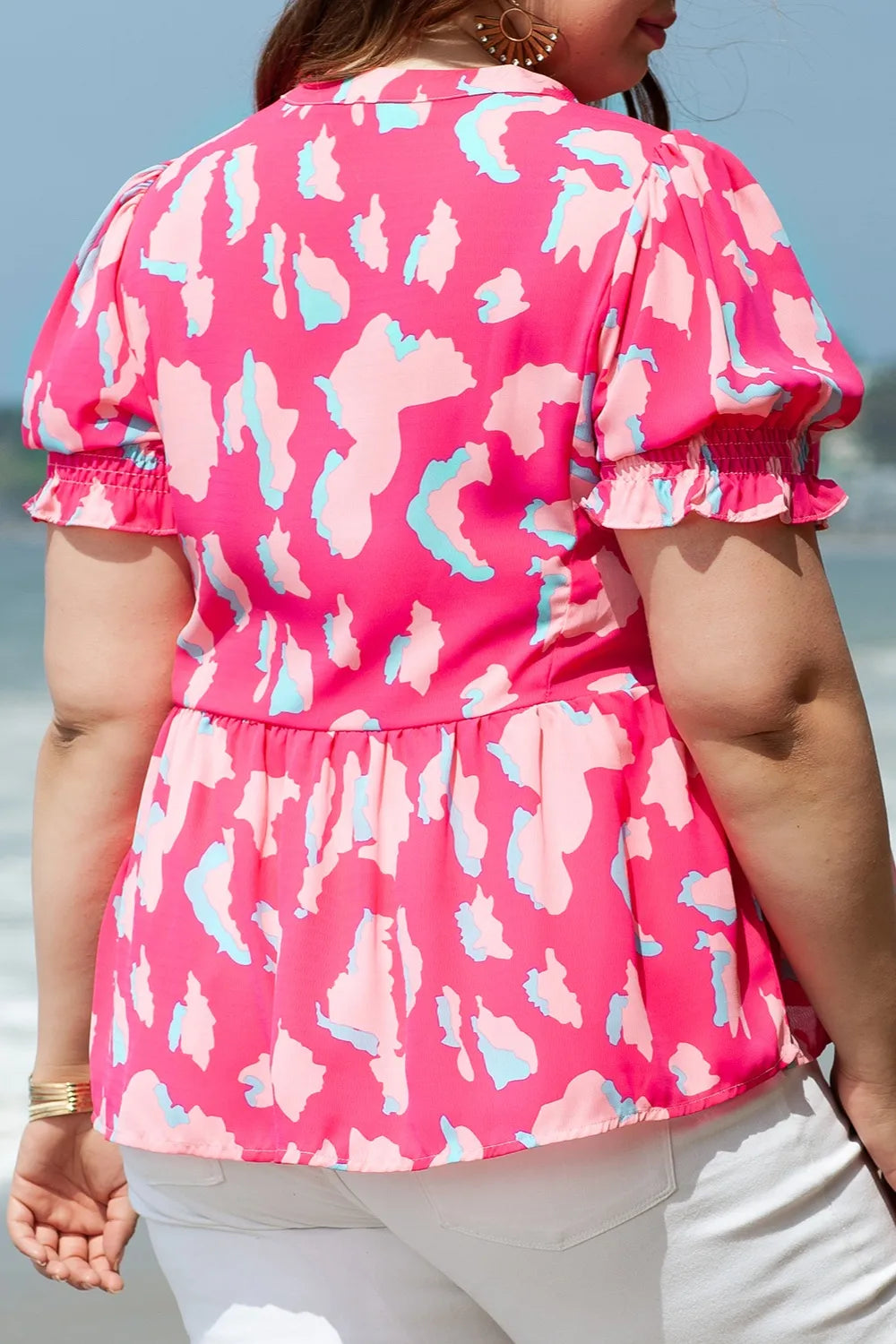 Plus Size Ruffled Printed Notched Short Sleeve Blouse - Premium Plus Size Shirts from Trendsi - Just $30.96! Shop now at Handbags Specialist Headquarter