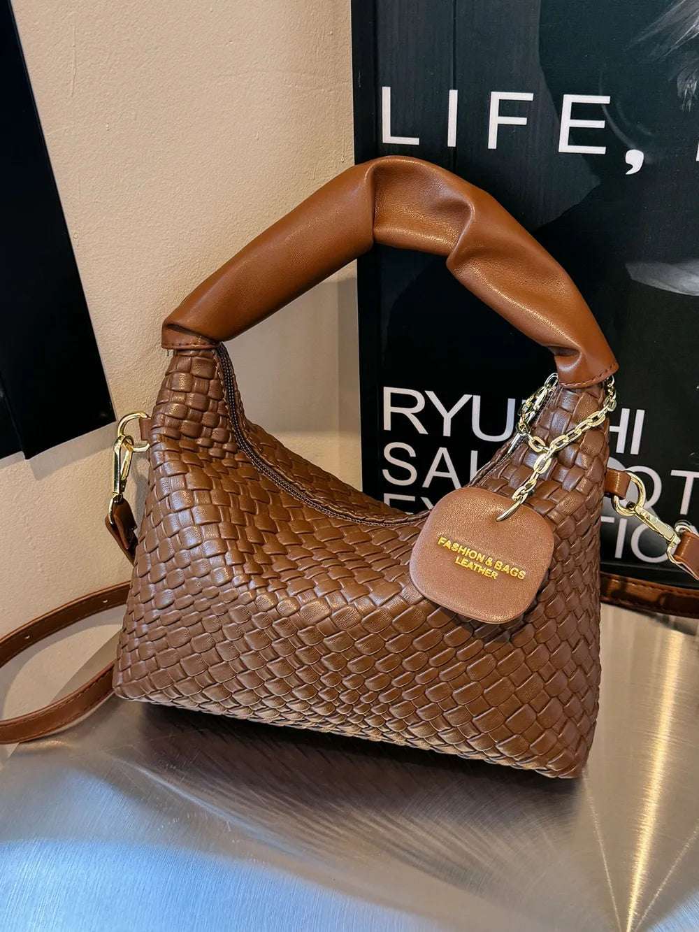 PU Leather Woven Crossbody Bag - Premium Crossbody Bag from Trendsi - Just $27.99! Shop now at Handbags Specialist Headquarter