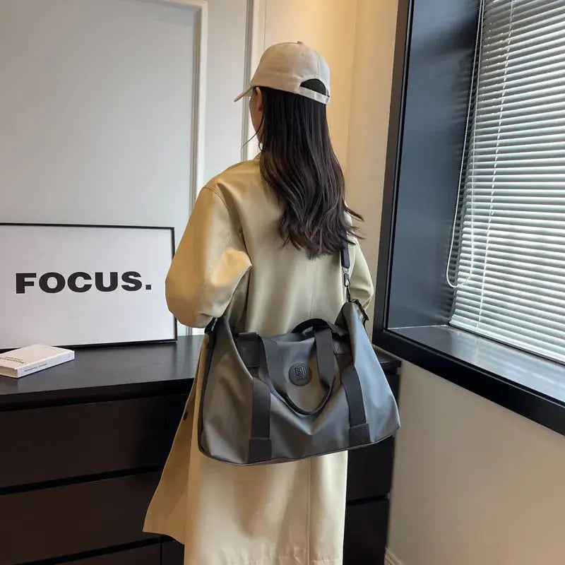 Oxford Cloth Travel Handbag.