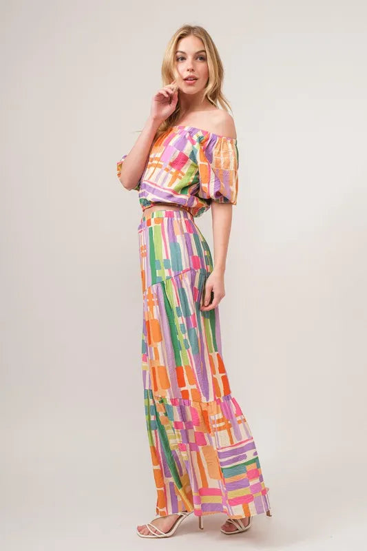 And The Why Asymmetric Geo Printed Tiered Maxi Skirt - Premium Skirts from Trendsi - Just $47.99! Shop now at Handbags Specialist Headquarter