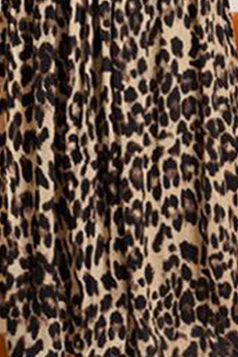Plus Size Leopard Elastic Waist Midi Skirt - Premium from Trendsi - Just $34.99! Shop now at Handbags Specialist Headquarter