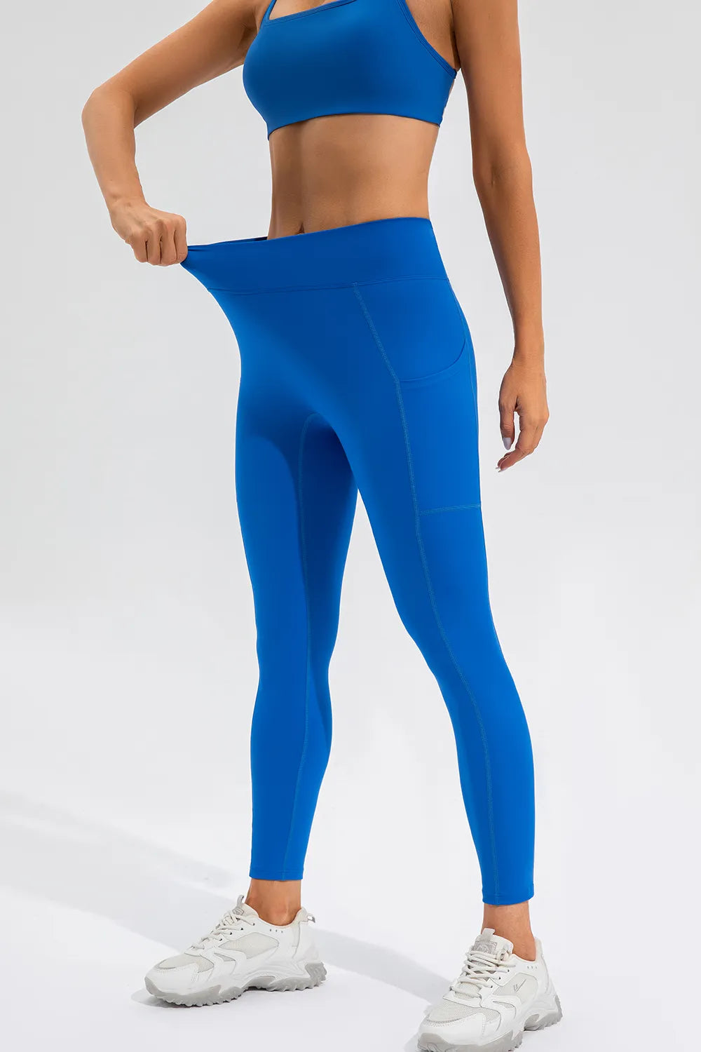 High Waist Active Leggings with Pockets - Premium Leggings from Trendsi - Just $47.28! Shop now at Handbags Specialist Headquarter