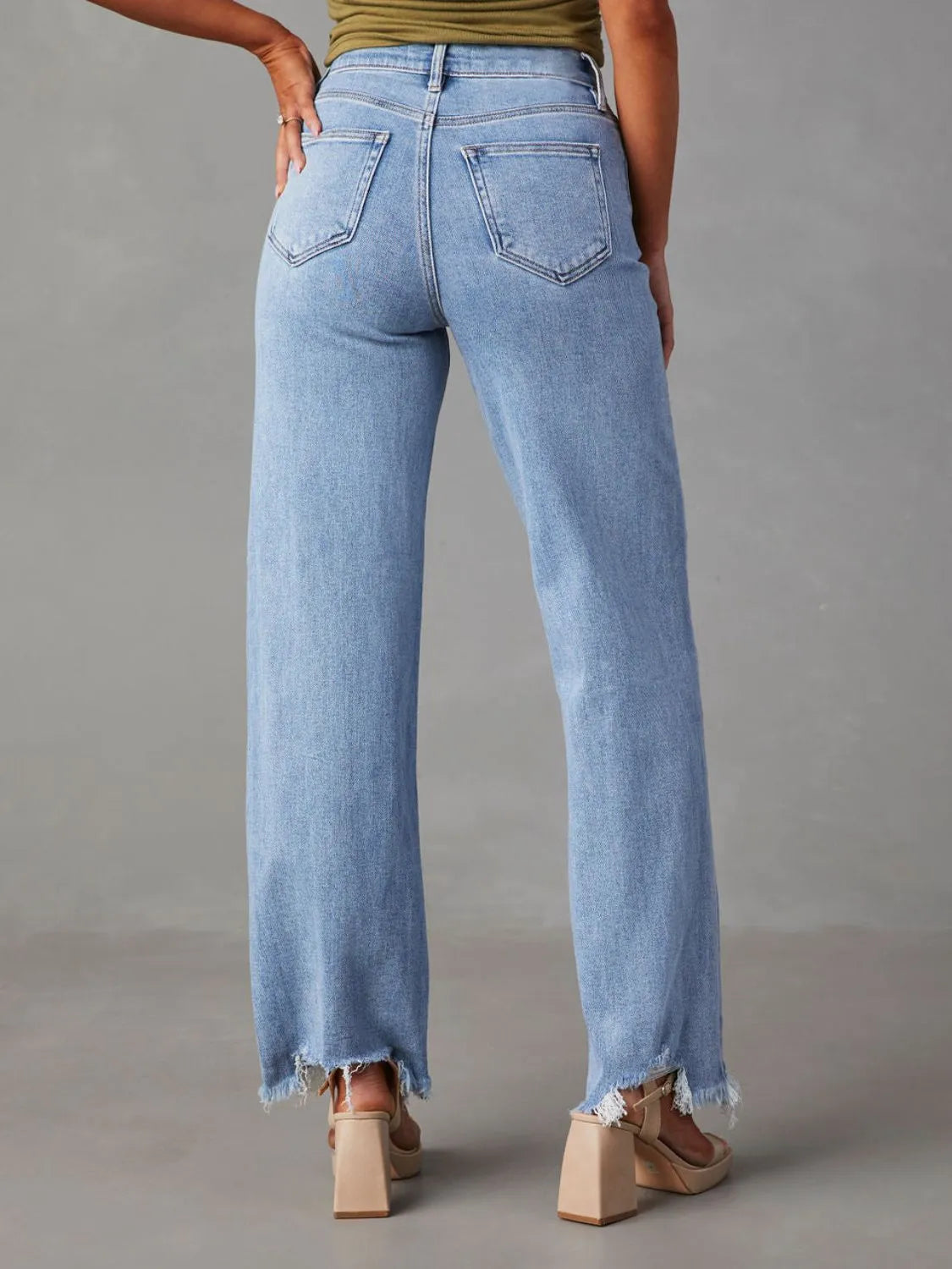 Raw Hem Loose Fit Jeans - Premium Women / Jeans & Denim from Trendsi - Just $33.98! Shop now at Handbags Specialist Headquarter