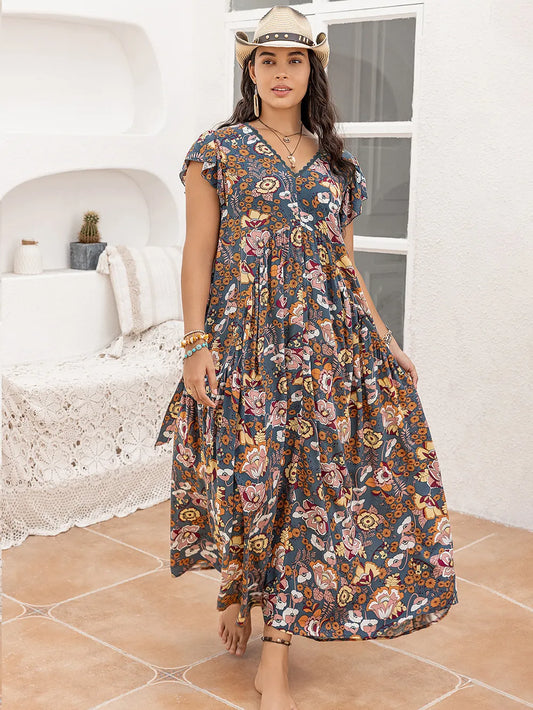 Plus Size Ruffled Printed Cap Sleeve Dress - Premium Dresses from Trendsi - Just $43.99! Shop now at Handbags Specialist Headquarter