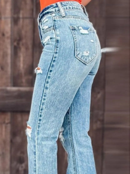 Distressed Slit Bootcut Jeans - Premium Women / Jeans & Denim from Trendsi - Just $29.88! Shop now at Handbags Specialist Headquarter