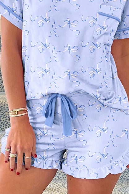 Bow Print Short Sleeve Top and Shorts Pajama Set - Premium Sleepwear from Trendsi - Just $39.99! Shop now at Handbags Specialist Headquarter