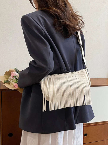 PU Leather Fringe Studded Crossbody Bag - Premium Crossbody Bag from Trendsi - Just $29.99! Shop now at Handbags Specialist Headquarter