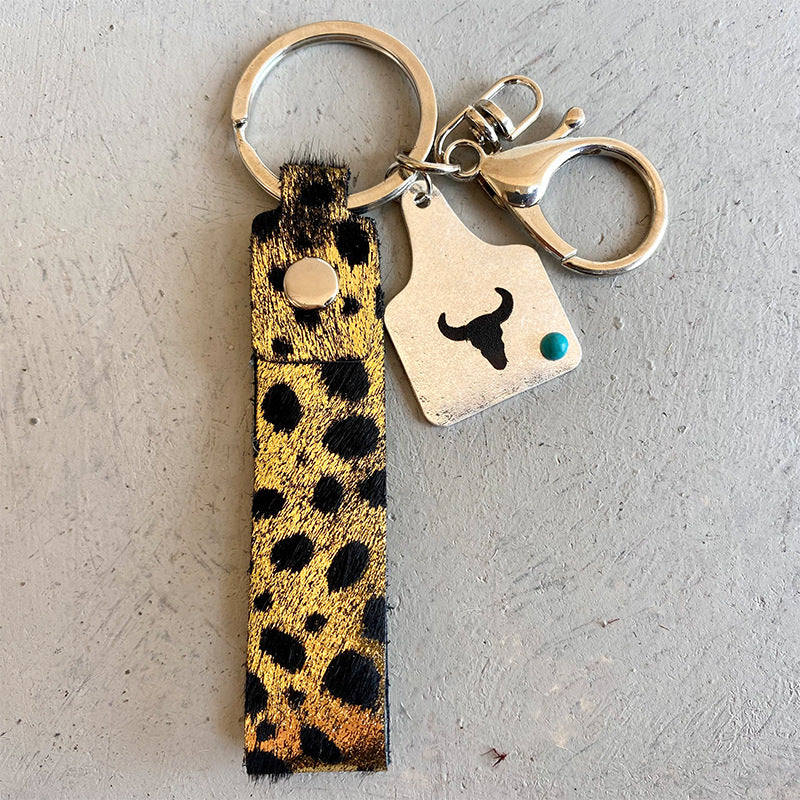 Genuine Leather Alloy Keychain - Premium Key chain from Trendsi - Just $12! Shop now at Handbags Specialist Headquarter