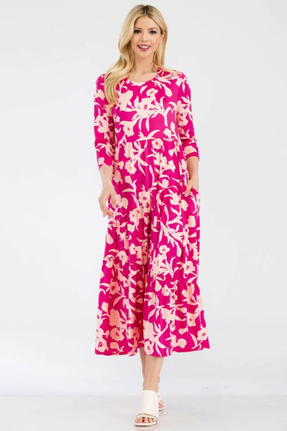 Celeste Full Size Floral Round Neck Ruffle Hem Dress.