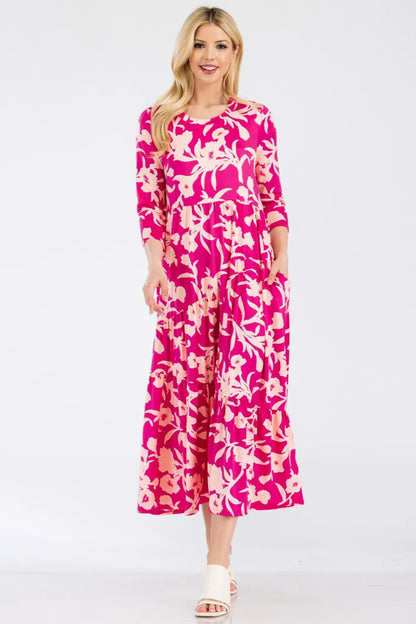 Celeste Full Size Floral Round Neck Ruffle Hem Dress - Premium Dresses from Trendsi - Just $50.99! Shop now at Handbags Specialist Headquarter