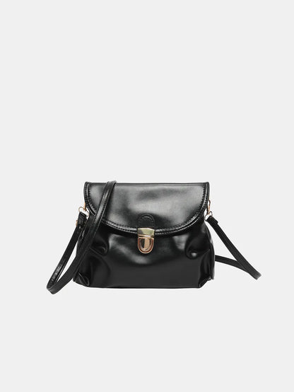 PU Leather Adjustable Strap Crossbody Bag - Premium Crossbody Bag from Trendsi - Just $18.99! Shop now at Handbags Specialist Headquarter