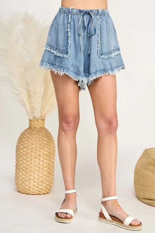SAGE+FIG Frayed Drawstring Denim Shorts - Premium Women / Jeans & Denim from Trendsi - Just $39.54! Shop now at Handbags Specialist Headquarter