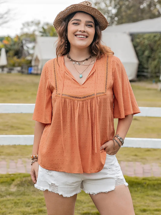 Plus Size Ruched Tie Neck Half Sleeve Blouse - Premium Plus Size Shirts from Trendsi - Just $26.98! Shop now at Handbags Specialist Headquarter