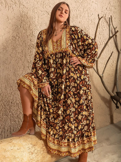 Plus Size Printed V-Neck Balloon Sleeve Dress - Premium Dresses from Trendsi - Just $49.99! Shop now at Handbags Specialist Headquarter
