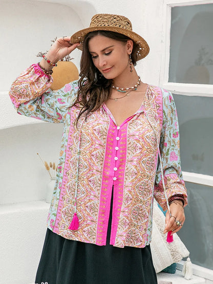 Plus Size Tie Neck Tassel Printed Blouse - Premium Plus Size Shirts from Trendsi - Just $30! Shop now at Handbags Specialist Headquarter