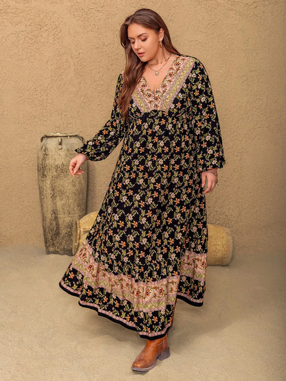 Plus Size Floral V-Neck Balloon Sleeve Dress - Premium Dresses from Trendsi - Just $45.99! Shop now at Handbags Specialist Headquarter