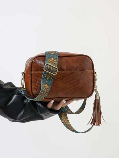 Tassel PU Leather Printed Strap Cassette Crossbody Bag - Premium Crossbody Bag from Trendsi - Just $22.99! Shop now at Handbags Specialist Headquarter