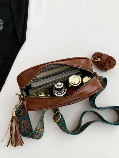 Tassel PU Leather Printed Strap Cassette Crossbody Bag - Premium Crossbody Bag from Trendsi - Just $22.99! Shop now at Handbags Specialist Headquarter