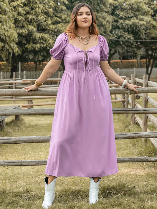 Plus Size Tie Neck Short Sleeve Dress - Premium Dresses from Trendsi - Just $35.99! Shop now at Handbags Specialist Headquarter
