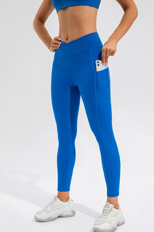 High Waist Active Leggings with Pockets - Premium Leggings from Trendsi - Just $47.28! Shop now at Handbags Specialist Headquarter