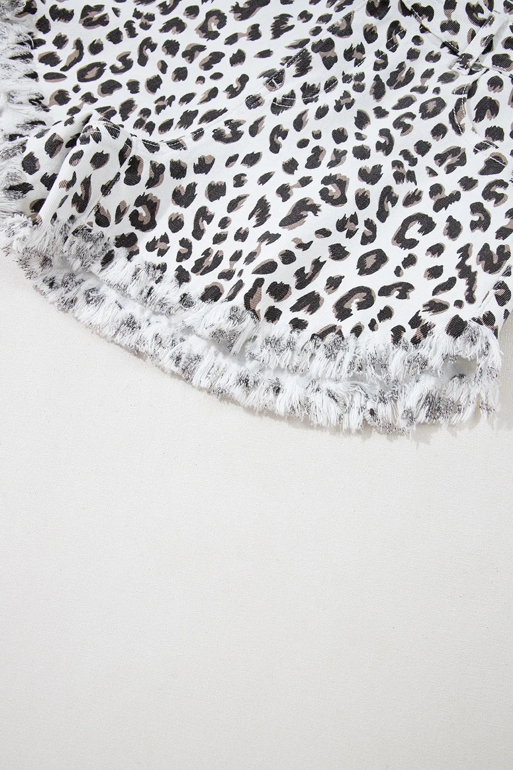 Leopard Frayed Hem Denim Shorts - Premium Women / Jeans & Denim from Trendsi - Just $33! Shop now at Handbags Specialist Headquarter