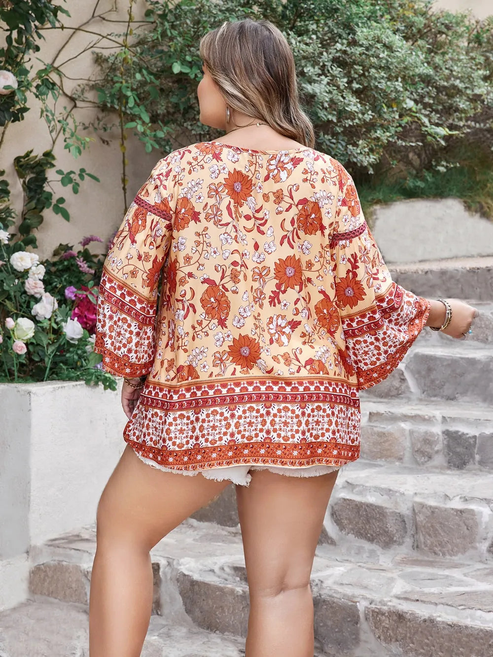 Plus Size Printed V-Neck Three-Quarter Sleeve Blouse - Premium Plus Size Shirts from Trendsi - Just $26! Shop now at Handbags Specialist Headquarter