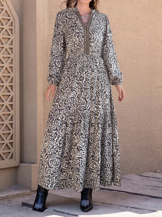 Printed Notched Long Sleeve Maxi Dress - Premium Maxi Dress from Trendsi - Just $40.99! Shop now at Handbags Specialist Headquarter
