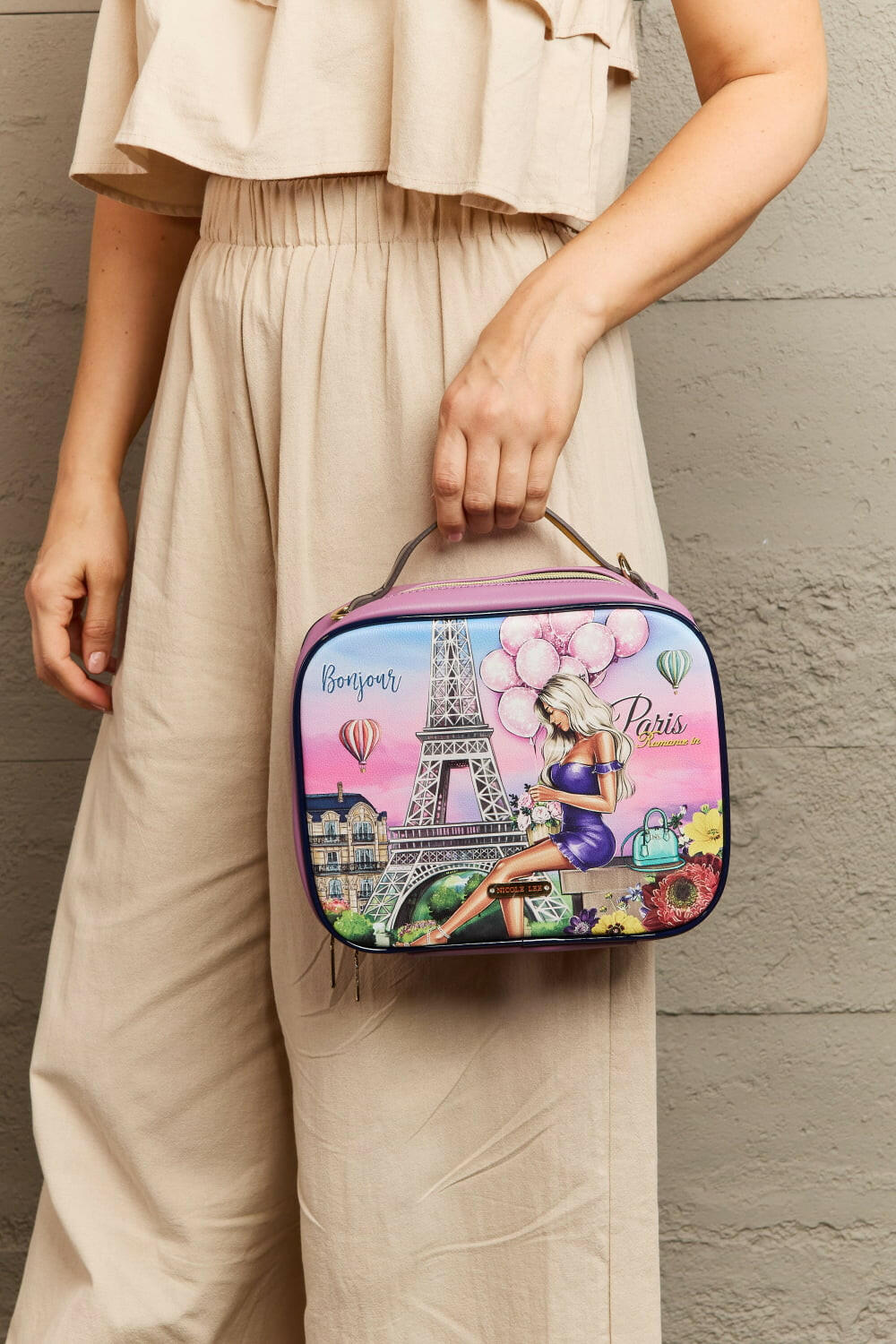 Nicole Lee USA Printed Handbag with Three Pouches.
