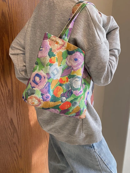 Printed Canvas Handbag with Zipper - Premium Handbags from Trendsi - Just $21.99! Shop now at Handbags Specialist Headquarter