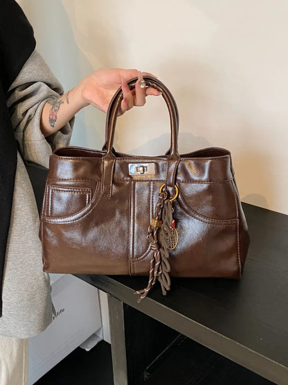PU Leather Handbag with Pendant - Premium Tote Bag from Trendsi - Just $40.99! Shop now at Handbags Specialist Headquarter