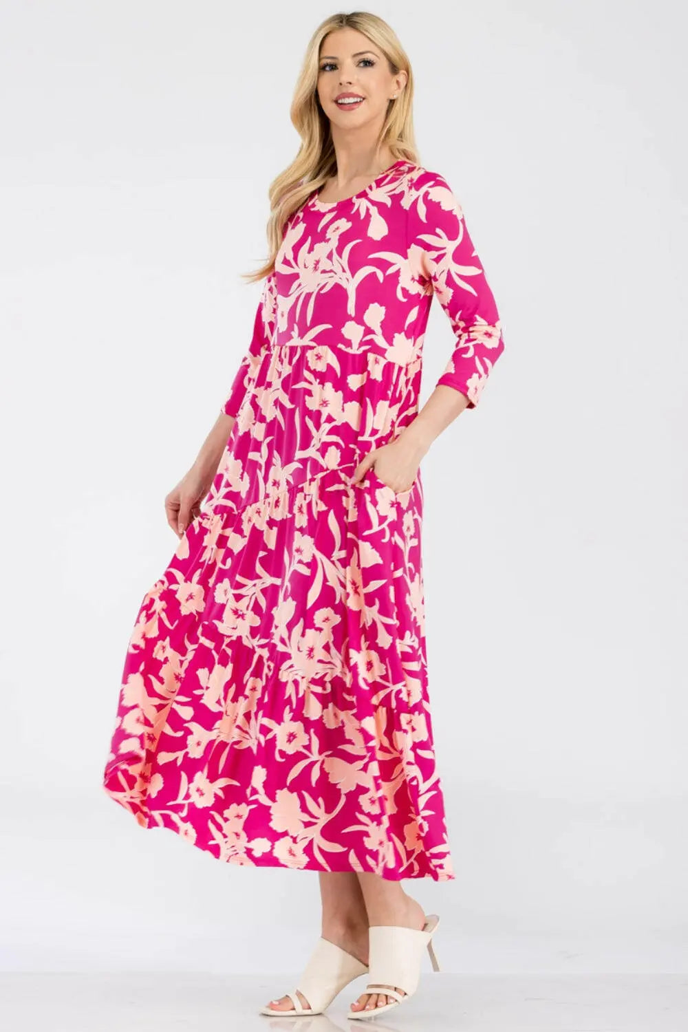 Celeste Full Size Floral Round Neck Ruffle Hem Dress.