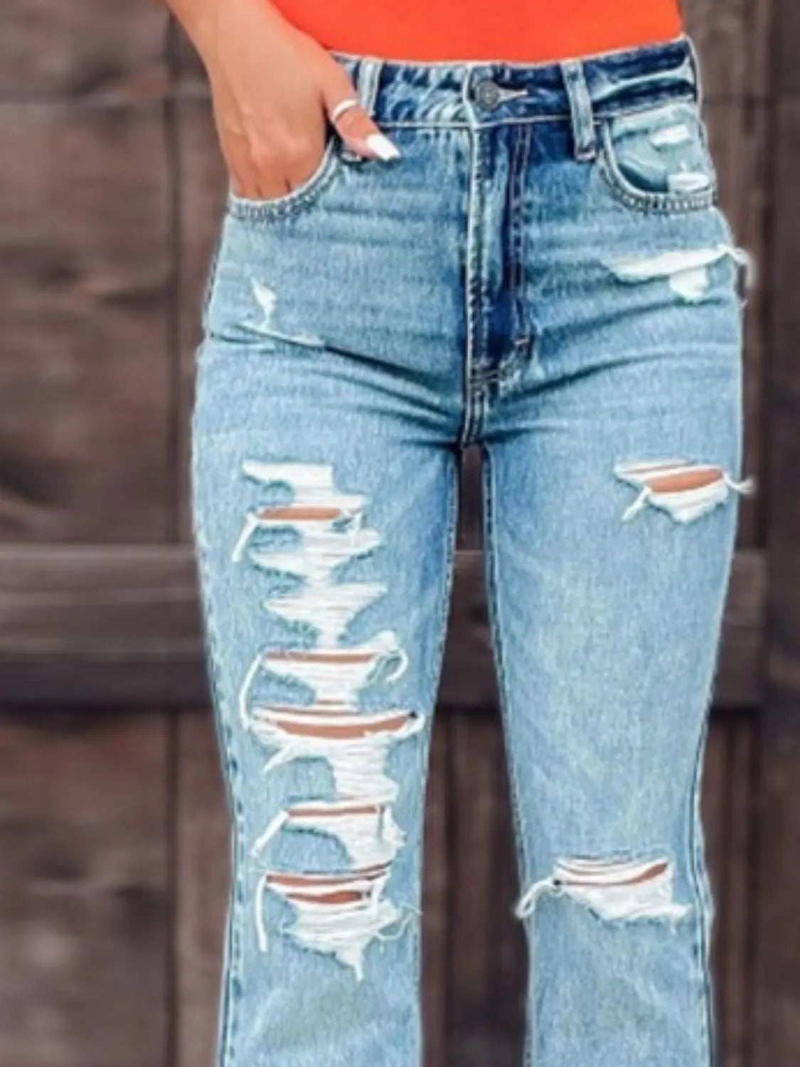 Distressed Slit Bootcut Jeans - Premium Women / Jeans & Denim from Trendsi - Just $29.88! Shop now at Handbags Specialist Headquarter